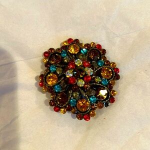 Vintage multicolored stone brooch.